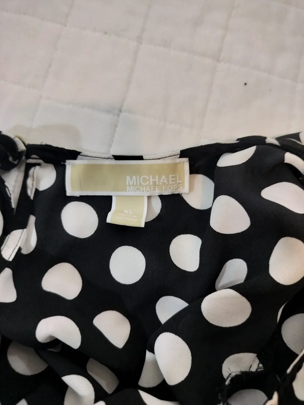 Michael Kors Black Blouse with White Polka Dots and Ruffle Hem